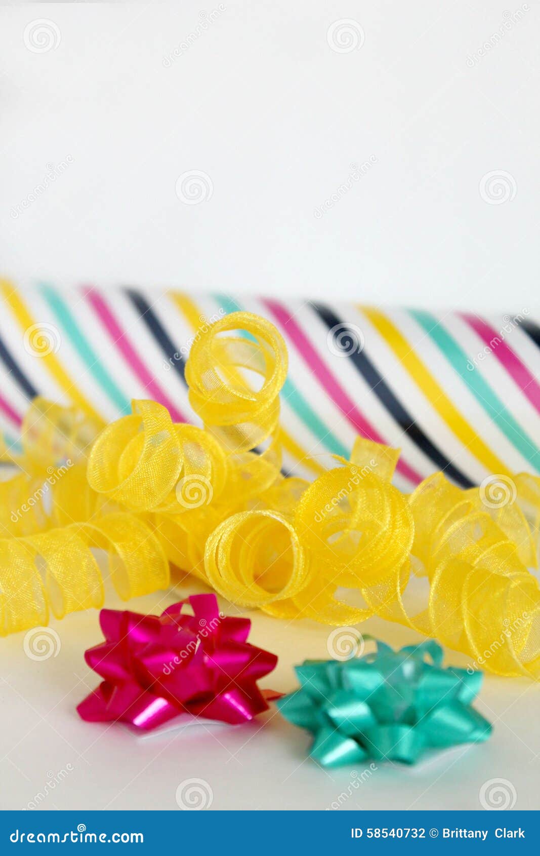 Colorful Birthday Gift Wrapping Paper with Ribbons and Bows Stock Photo