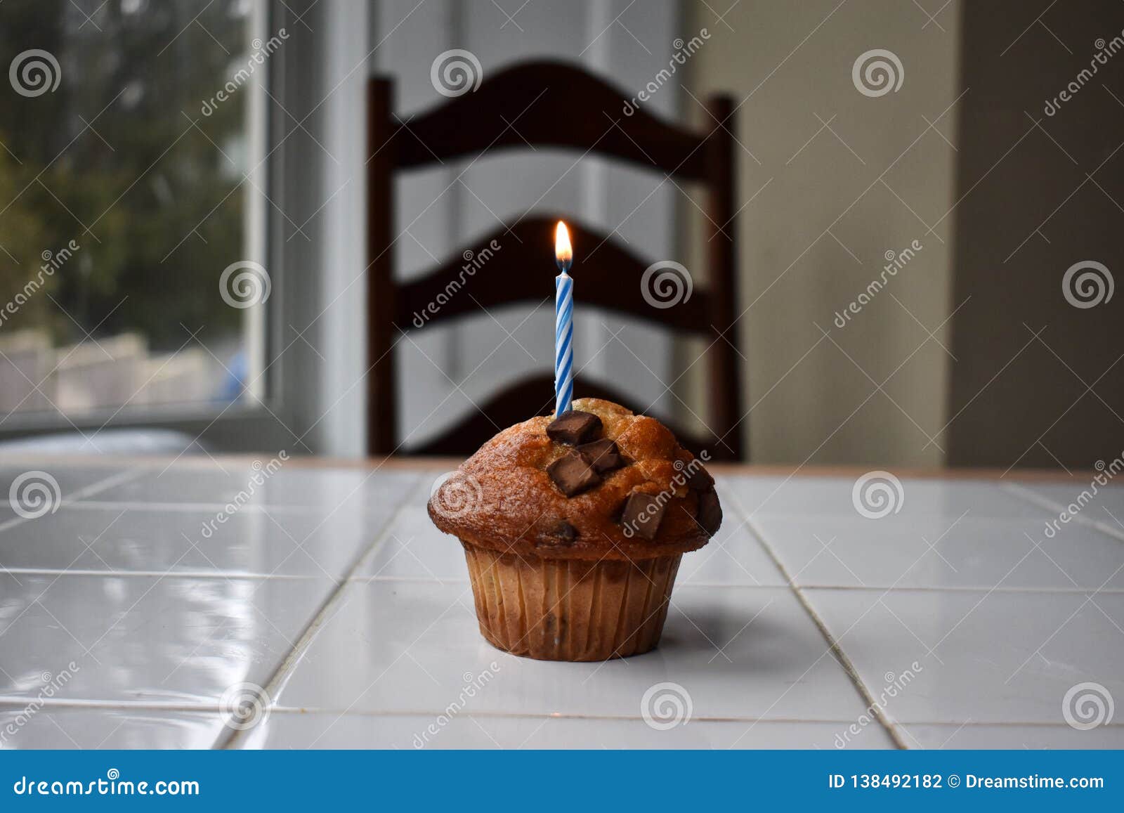 A Birthday Muffin with Candle Stock Photo Image of food, kitchen 138492182