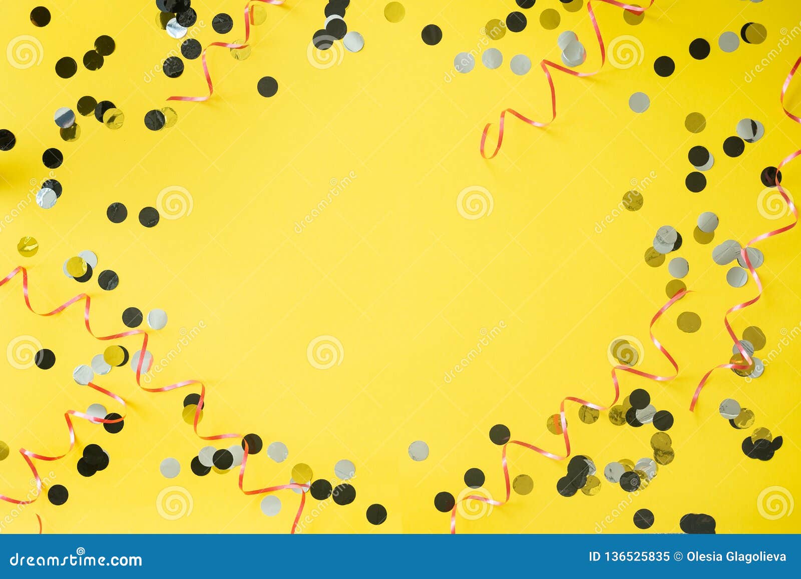 Birthday Party Background. Yellow Table with Confetti and Ribbon Stock