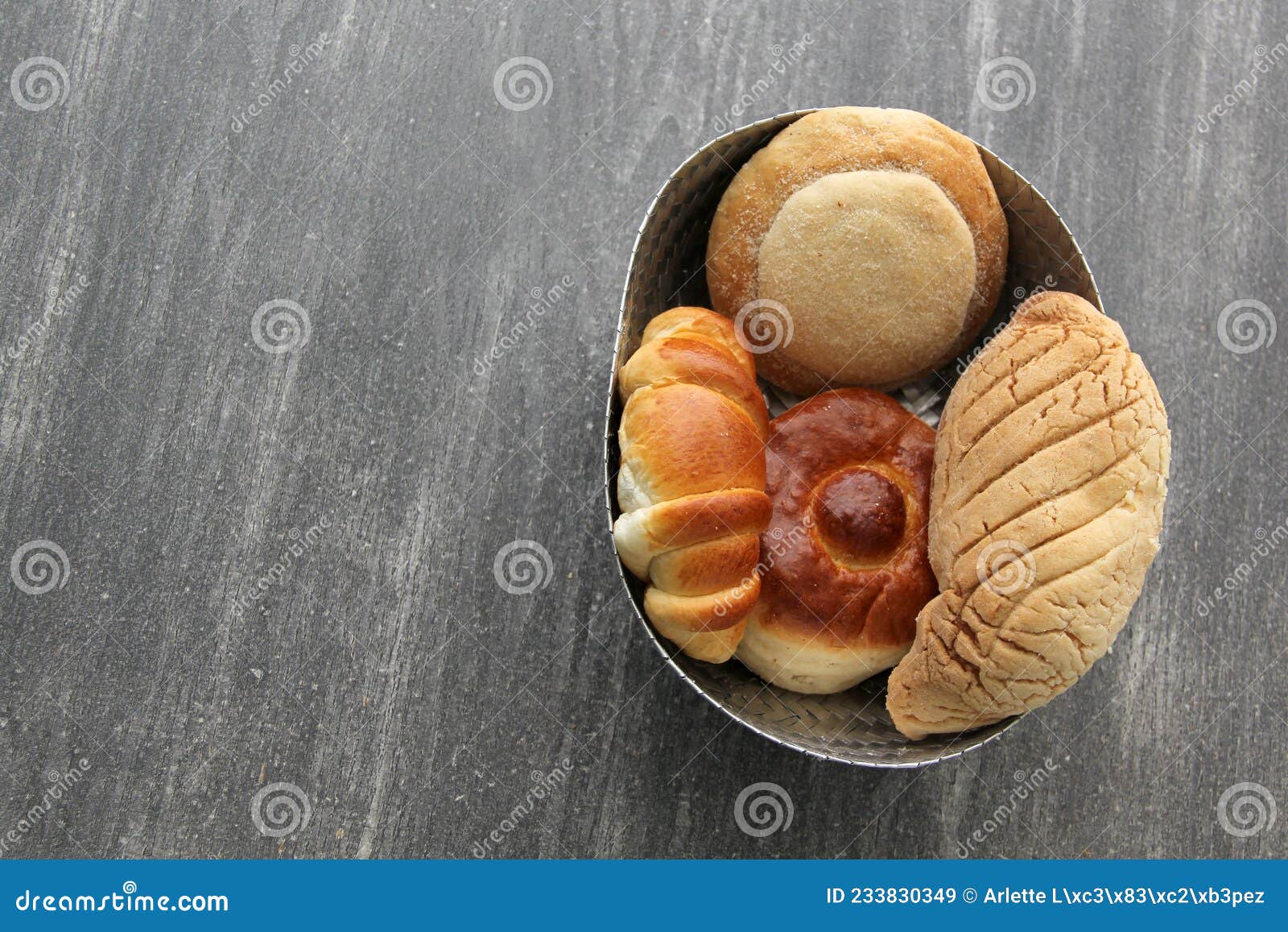 sweet bread: bisquet, croissant, ojo de pancha and gusano freshly made from mexican cuisine in a basket, or napkin accompanied by