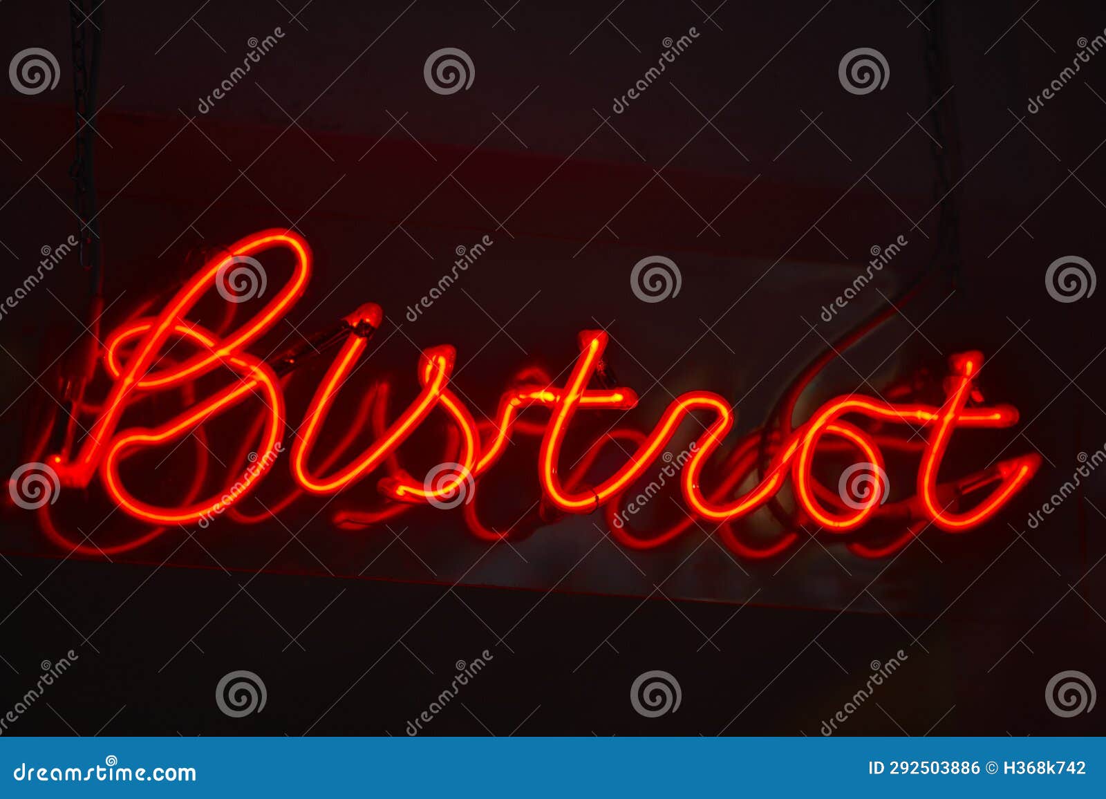 bistrot neon light by night. traditional french brasserie. france