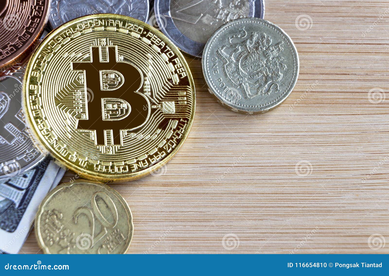 Bitcoin, British One Pound, And Euro Coins On Wooden Table ...