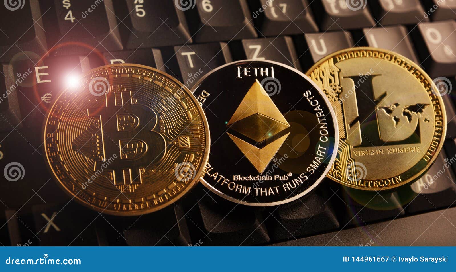 Bitcoin BTC, Ethereum ETH, Litecoin LTC Coins on Laptop Keyboard Editorial  Photography - Image of economy, bitcoins: 144961667