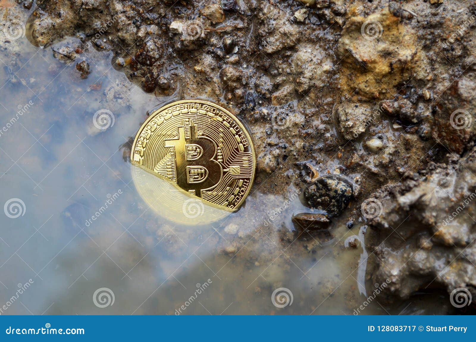 Bitcoin coin sinking editorial photography. Image of muddy 128083717