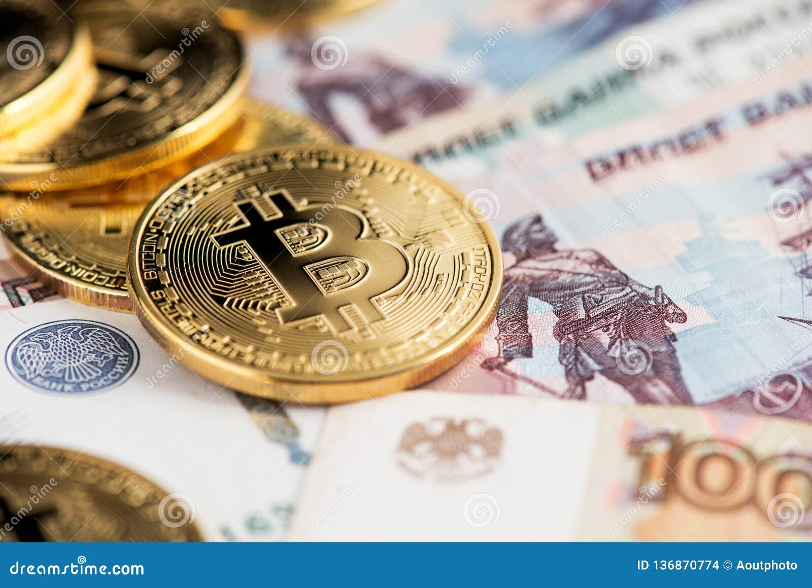 A Close Up Image Of Bitcoins With Russian Rubles Banknotes. Stock Photo ...