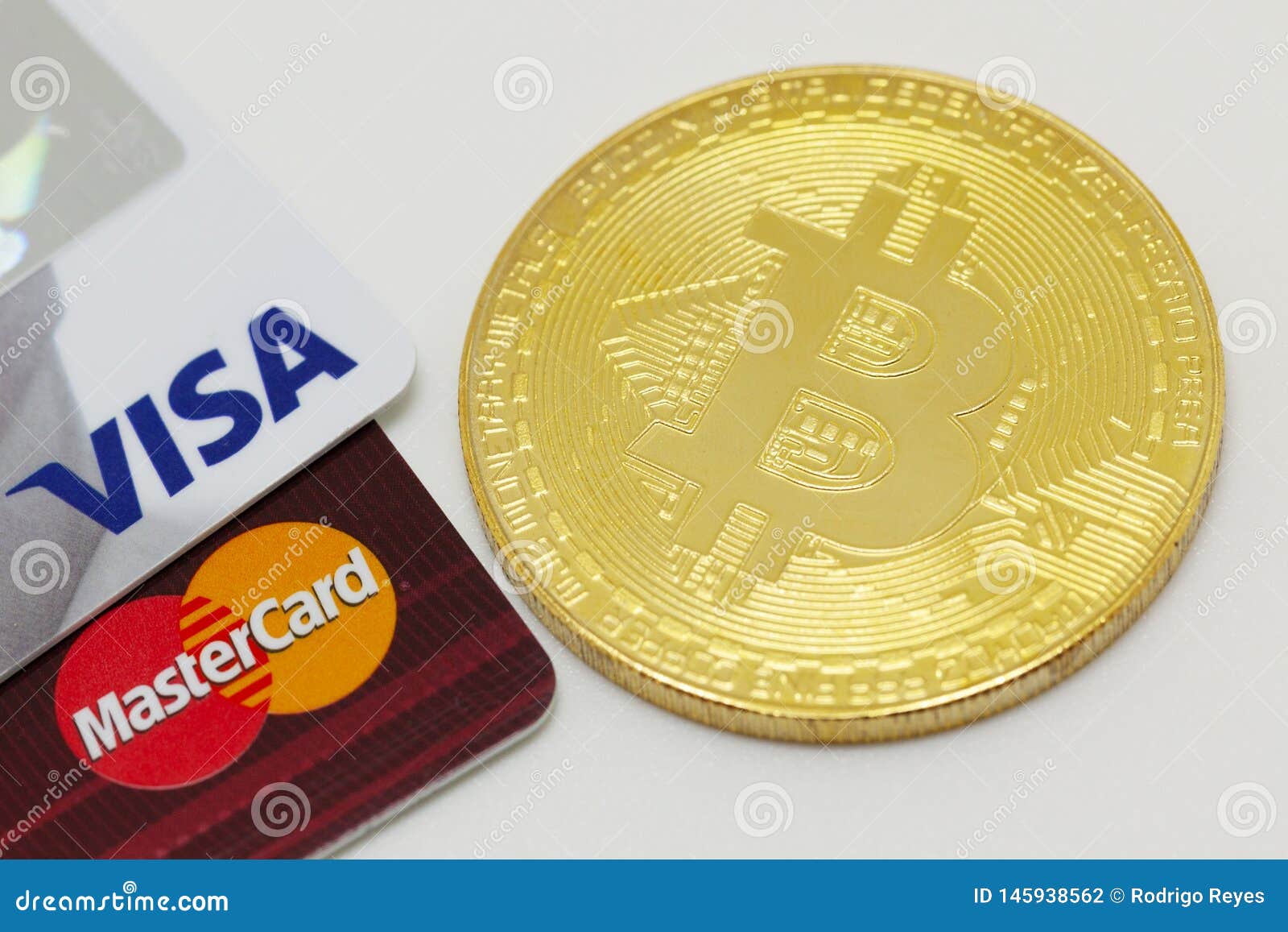 Bitcoin and credit cards editorial photography. Image of ...