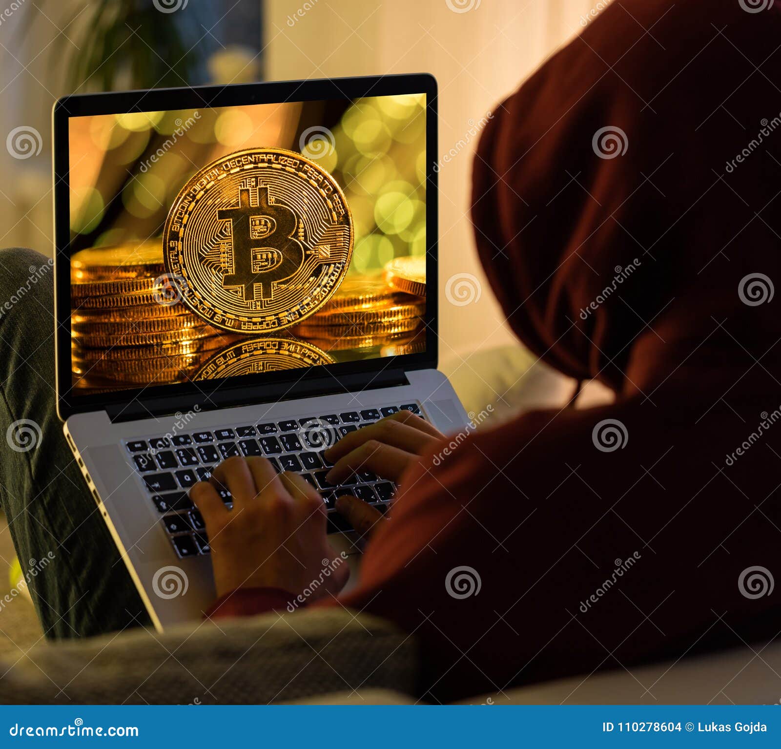 Bitcoin Gold Coin And Anonymous Hacker Sittign With Laptop ...