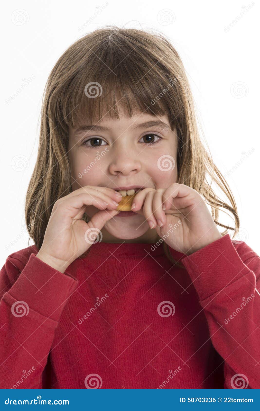 Biting a Cookie stock photo. Image of eating, dessert 50703236