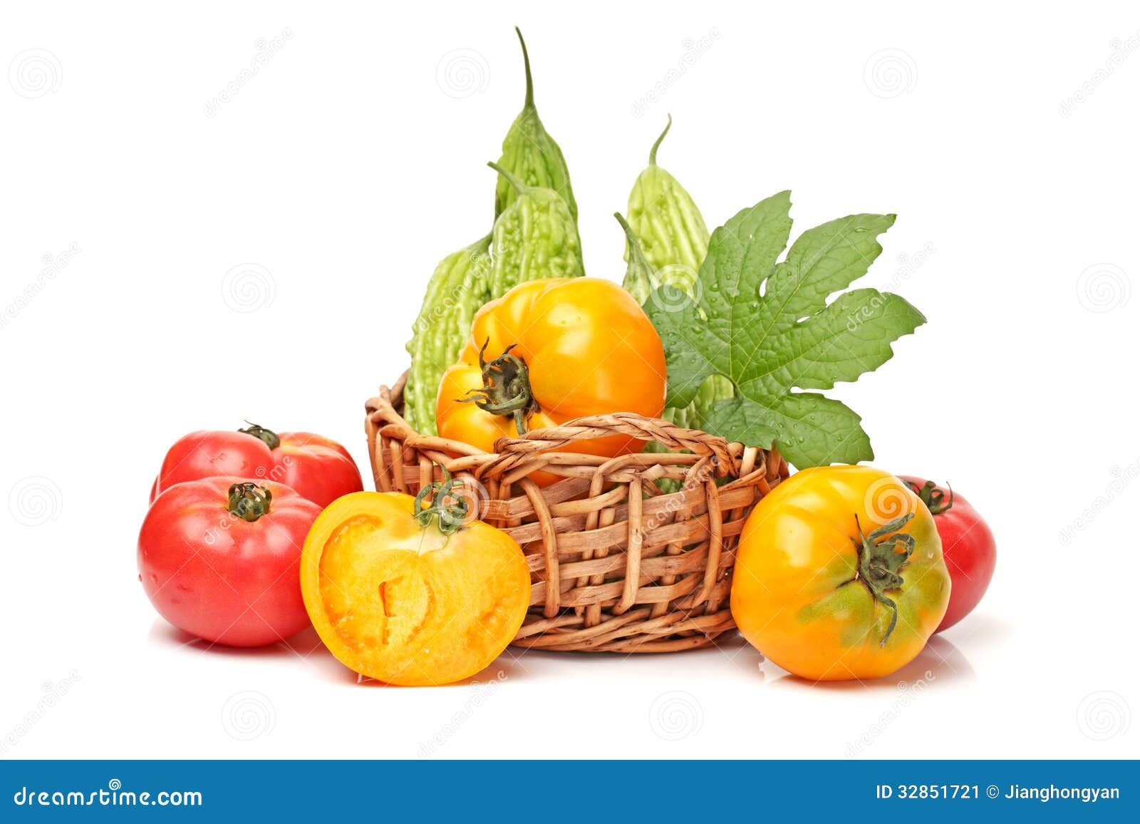 Bitter melon and tomatoes stock image. Image of closeup 32851721