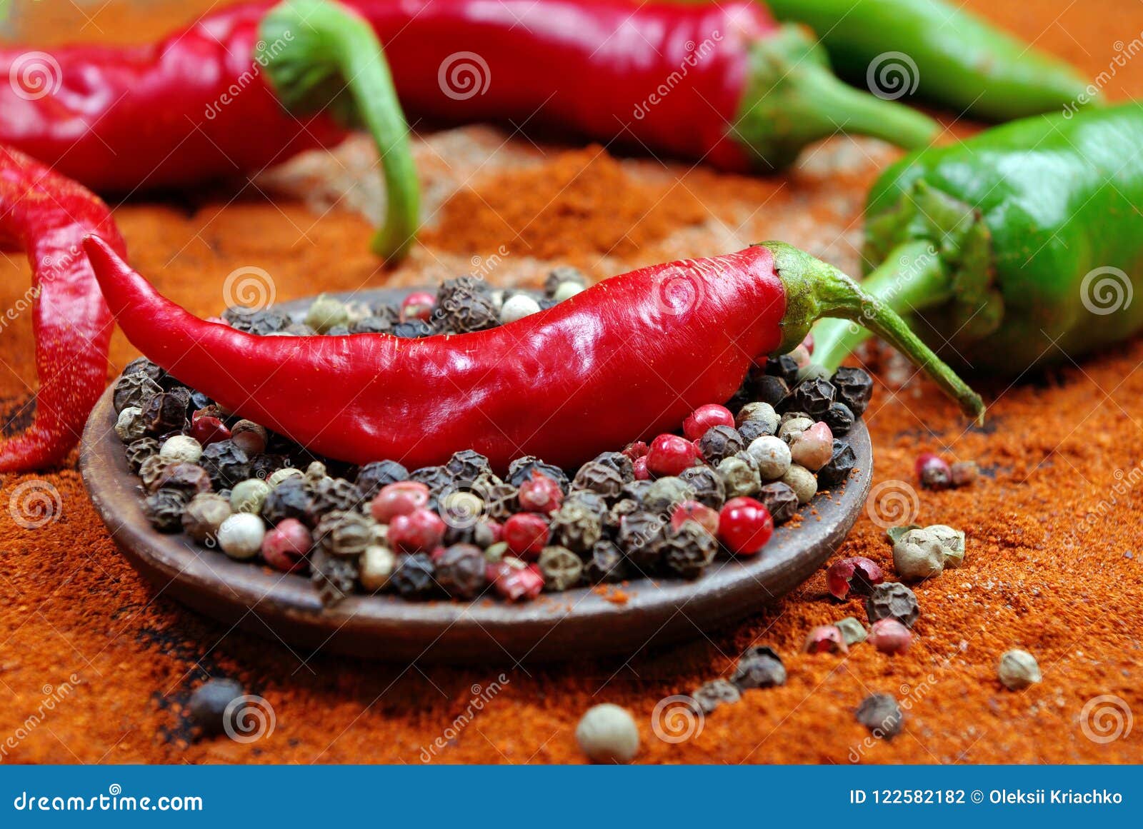 Red Ground Pepper and a Mixture of Peppers. Close Up. Stock Photo