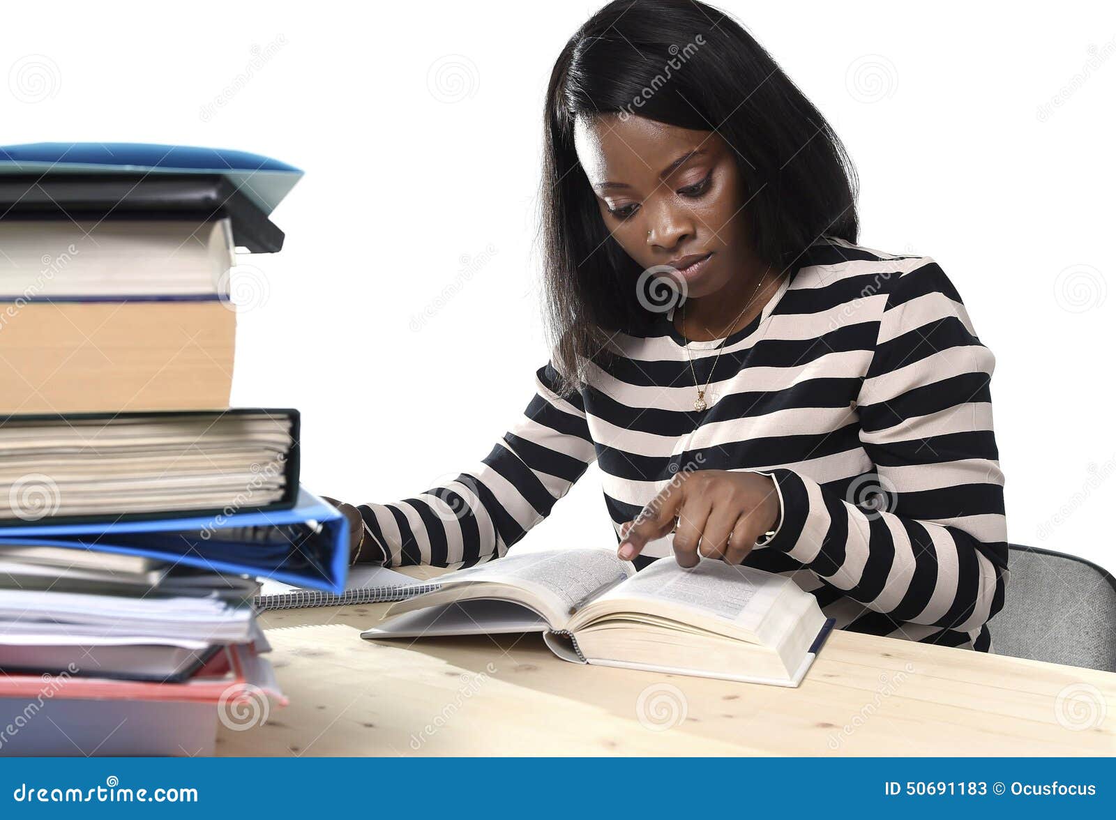 black african american ethnicity student girl studying textbook