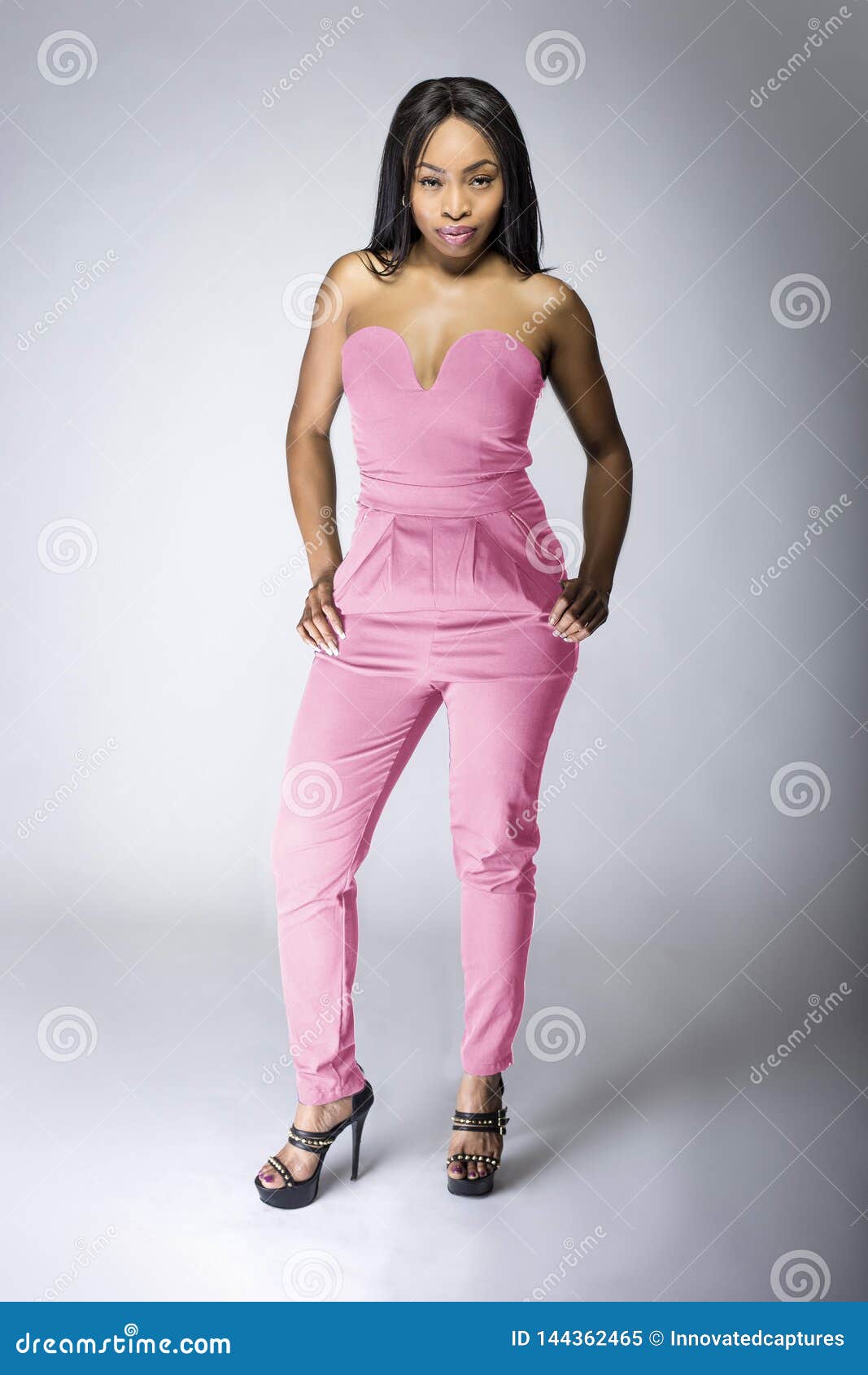 Black Female Fashion Model Wearing Pink Outfit Stock Image - Image of ...