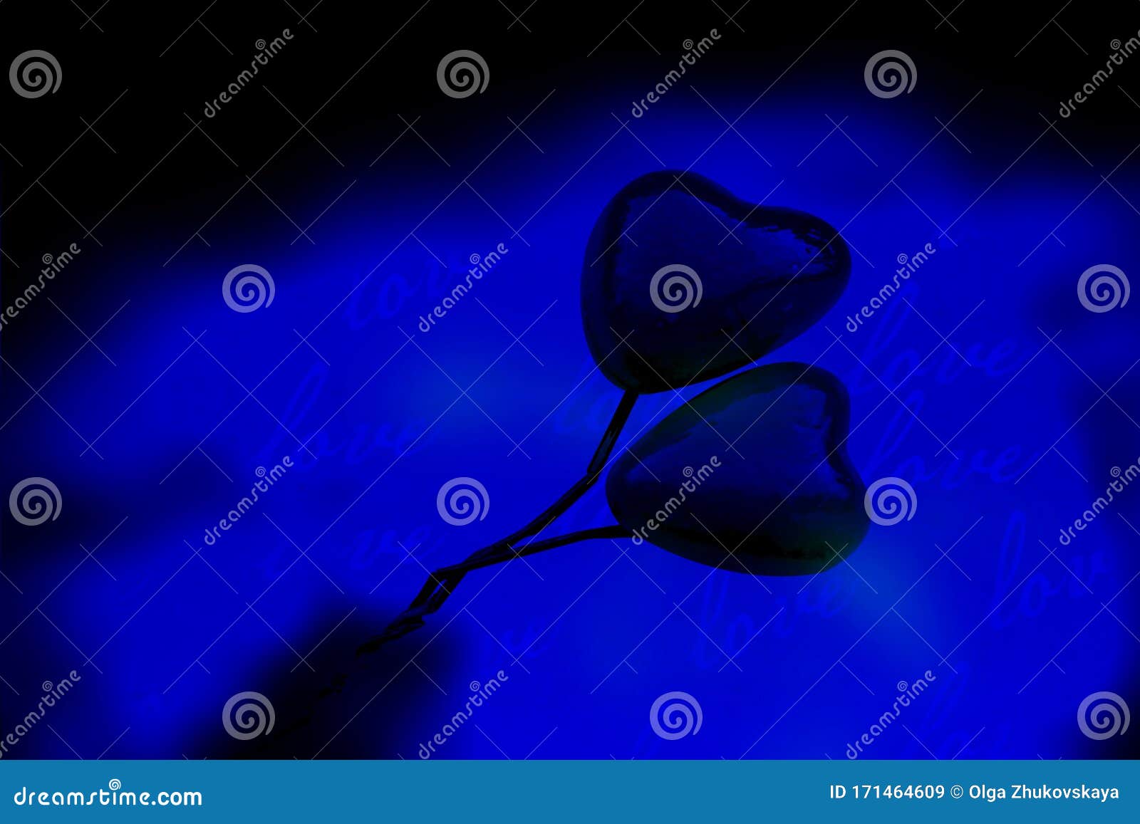 Black Background With A Blue Spot With Two Hearts. Black Background With Blue Hearts Royalty