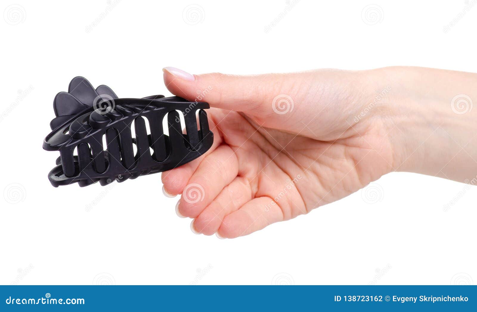 Black barrette in hand stock photo. Image of contemporary 138723162