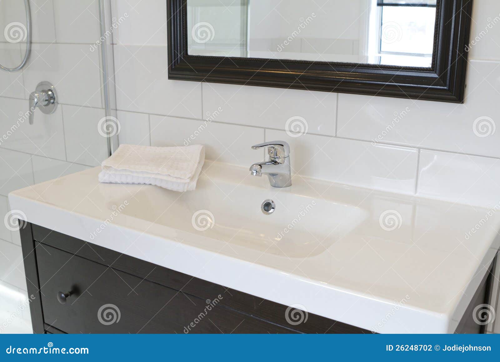 black bathroom vanity and mirror