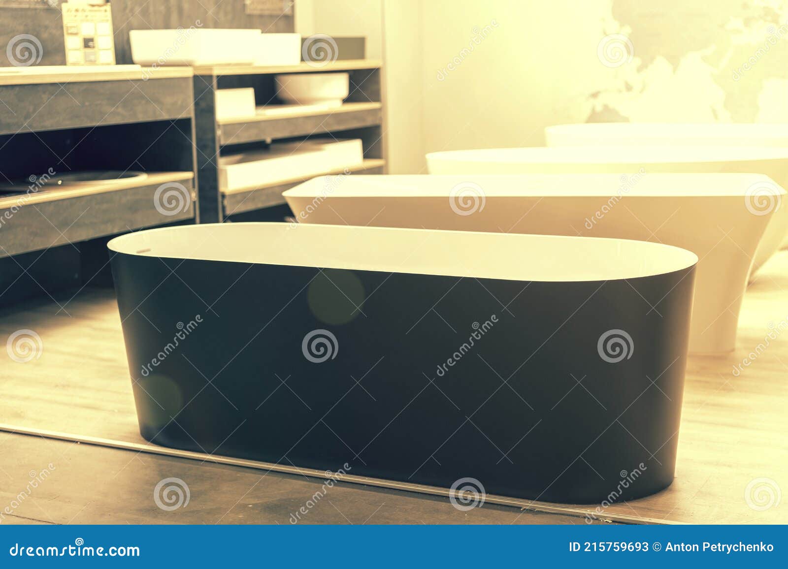 Black Bathtub at a Hardware Store. Sanitary Engineering Shop Stock
