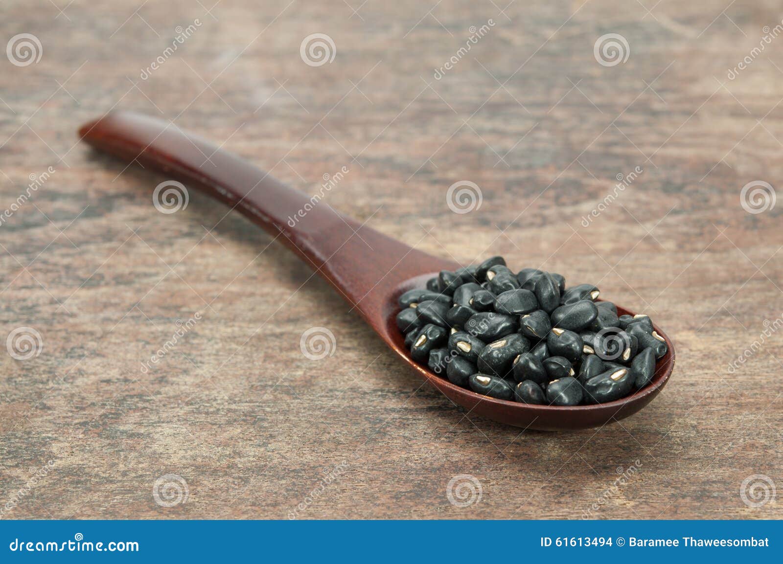 Black bean in wood spoon. stock photo. Image of weathered 61613494