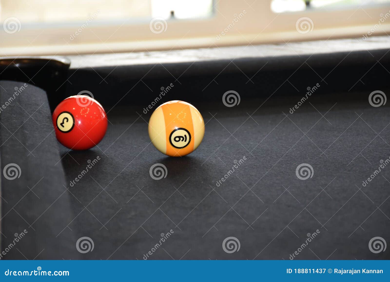 Black Billiard Ball In Front Of Corner Pocket On Green Baize Table