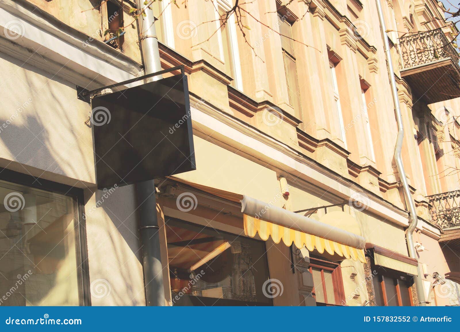 Black Blank Business Sign on Old Town European Building Stock Photo