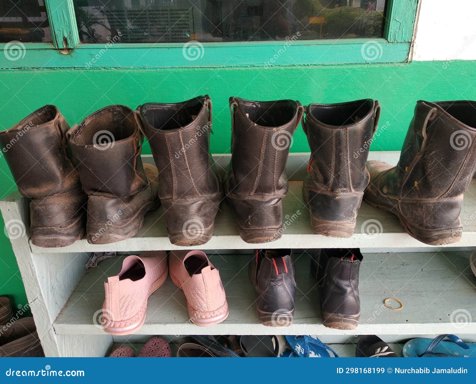 Black Boots on the Shoe Rack Stock Image Image of boot, cowboy 298168199