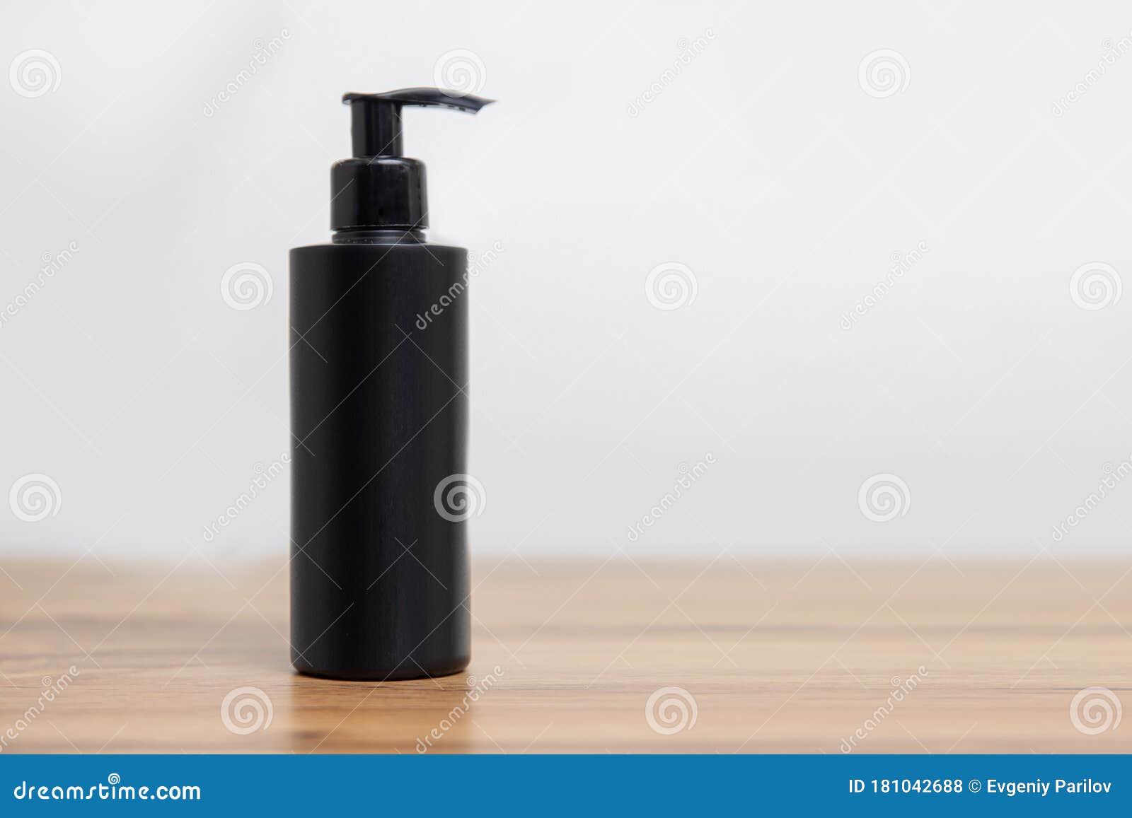 Download Black Bottle Mockup For Cosmetics Shampoo On Simple White ...