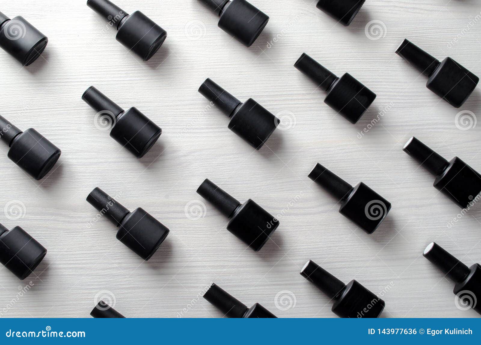 Black Bottles of Gel Nail Polish on the Table. Stock Photo Image of