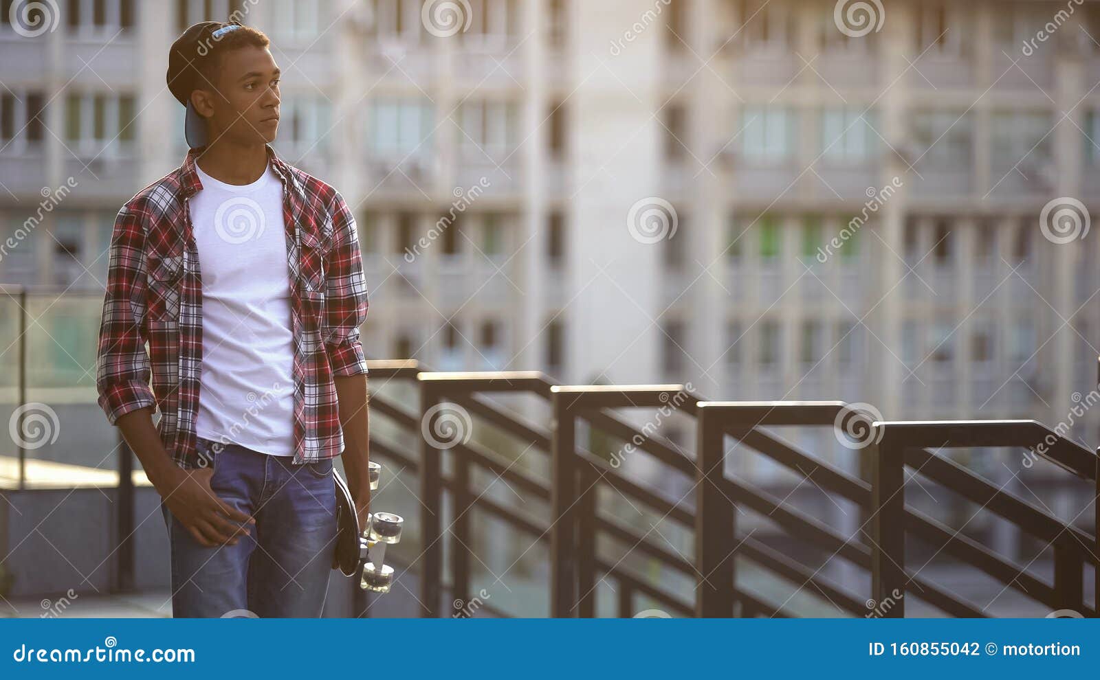 Black Boy with Skate Walking Alone on Street, Missing Friends ...