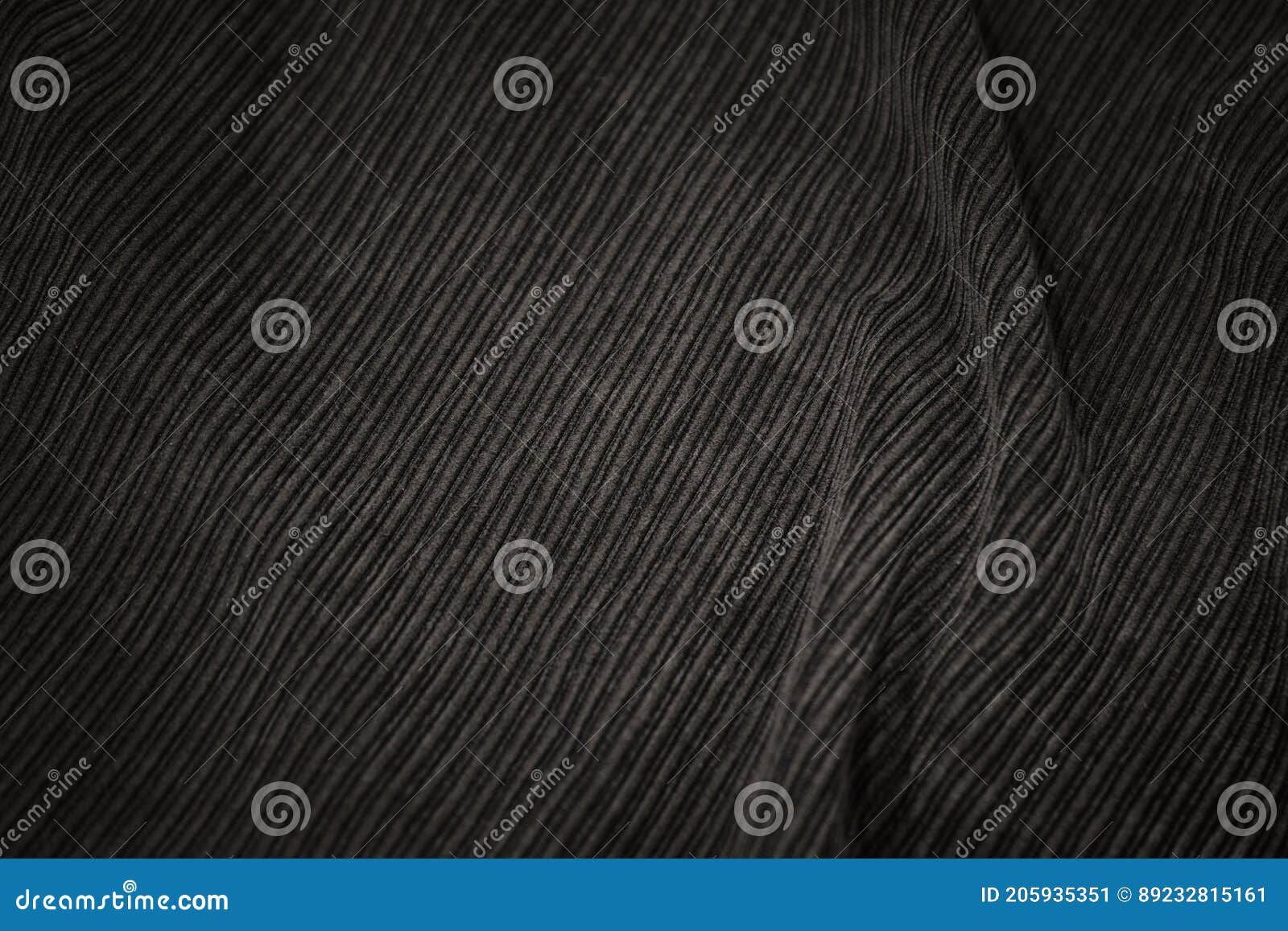 Smooth black cloth background folds. Black background abstract