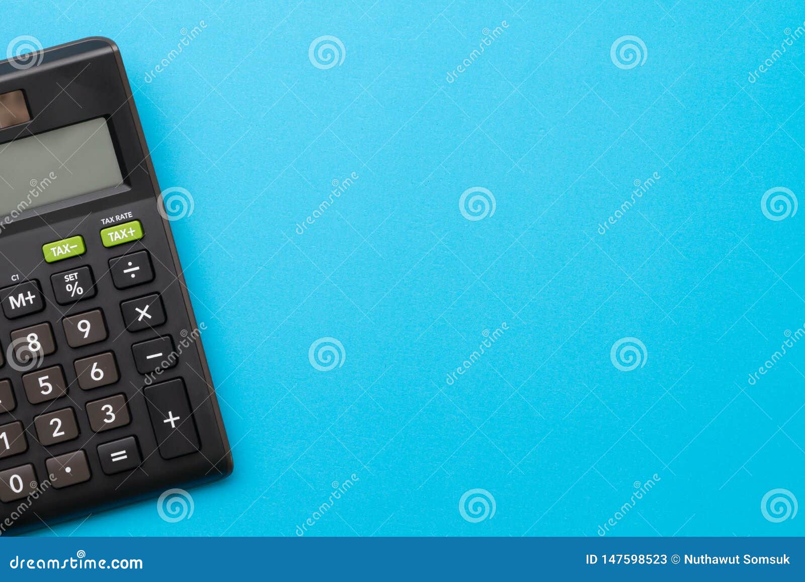 Black Calculator On Solid Blue Background With Copy Space Using For