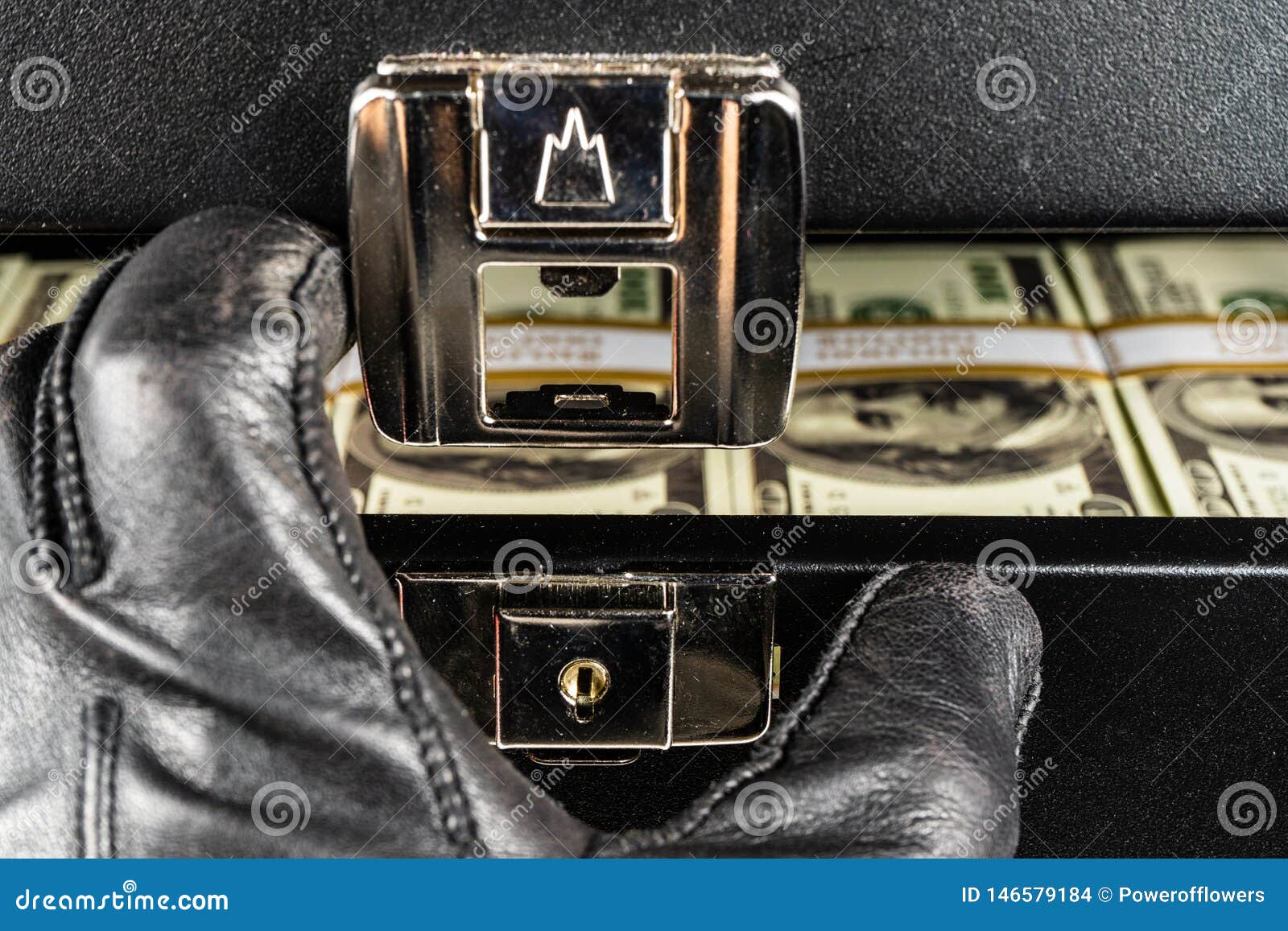 Black Case Full of Dollar Bills Close Up.Money Bricks in Case Stock