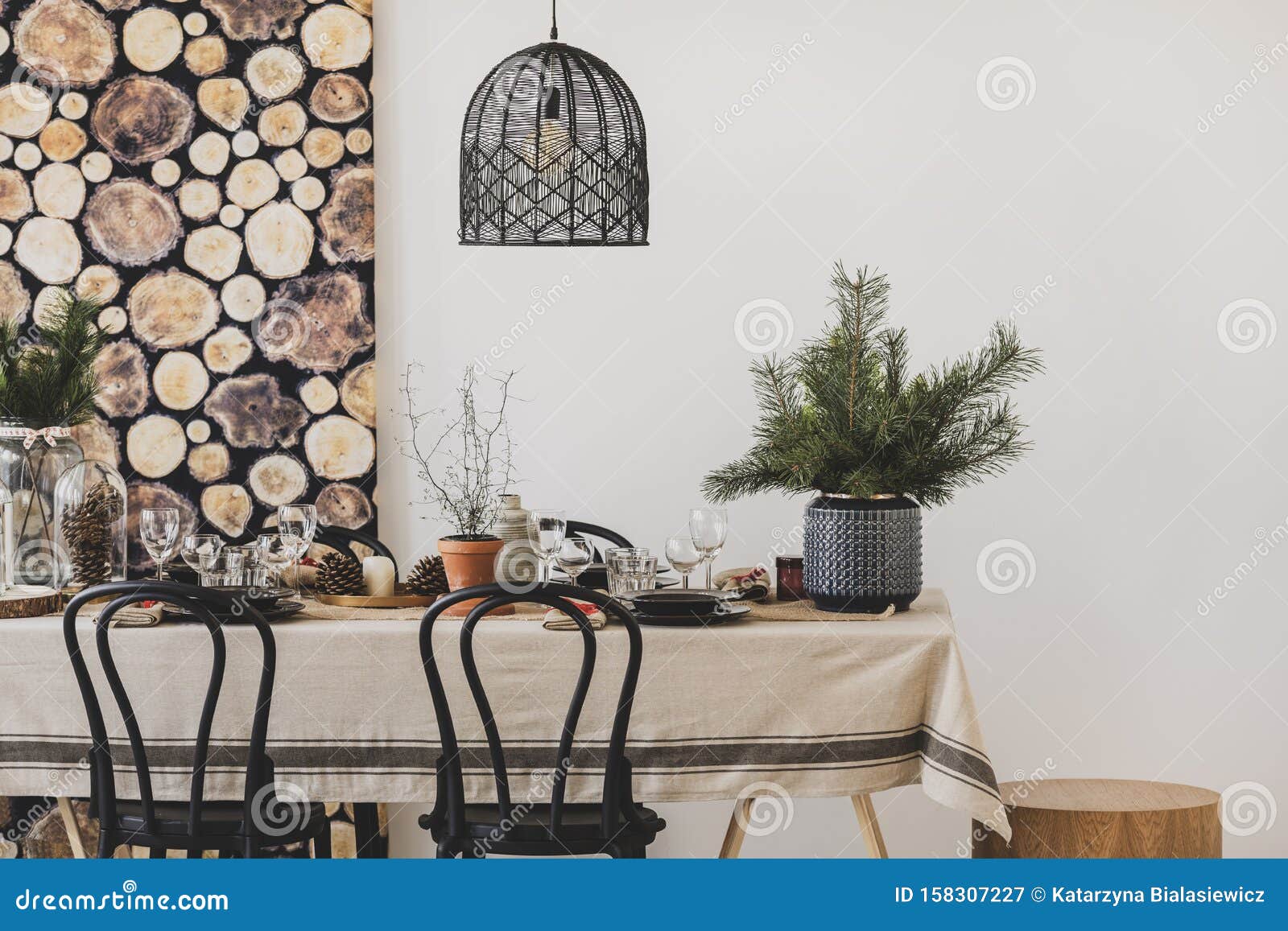 black chairs and pendant lamp in dining room