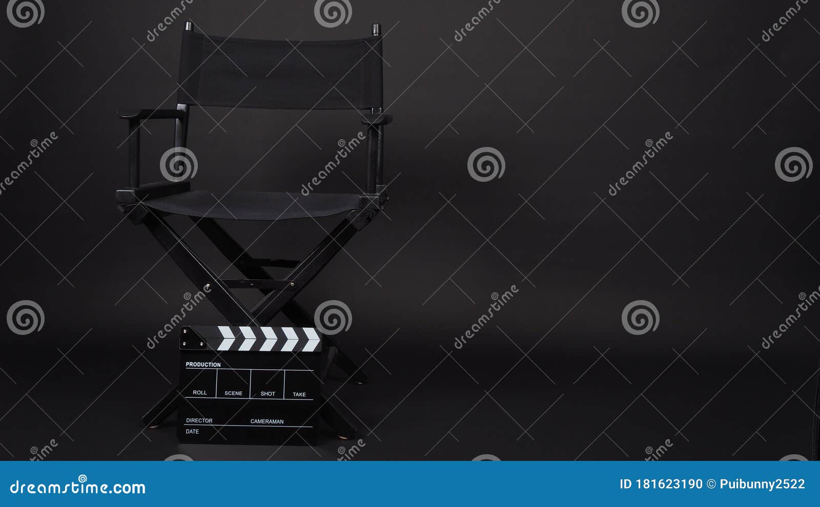 black clapperboard or clap board or movie slate with director chair use in video production ,film, cinema industry on black