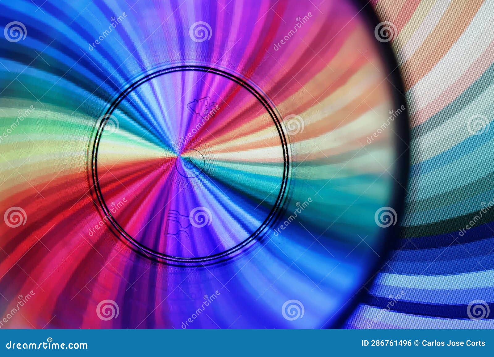 black concentric circles with multicolor bokeh background