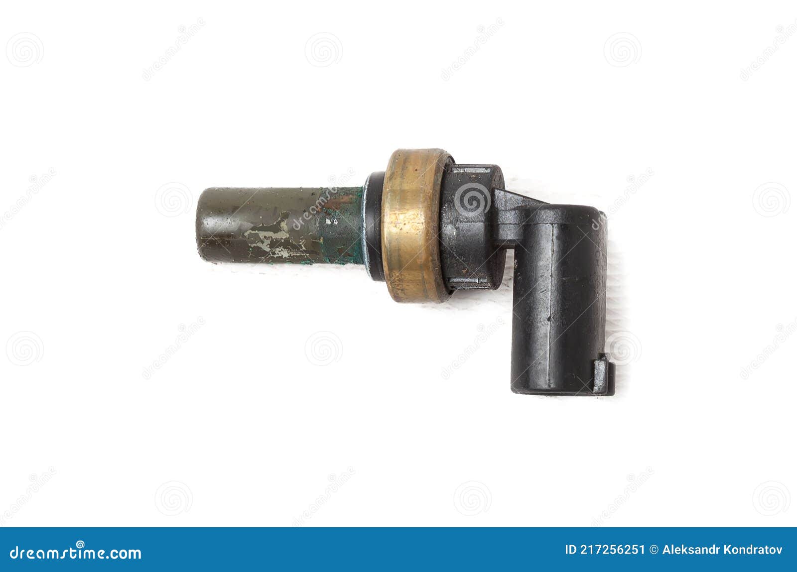 black coolant temperature sensor on a white background with yellow metal s. the engine control unit corrective composition