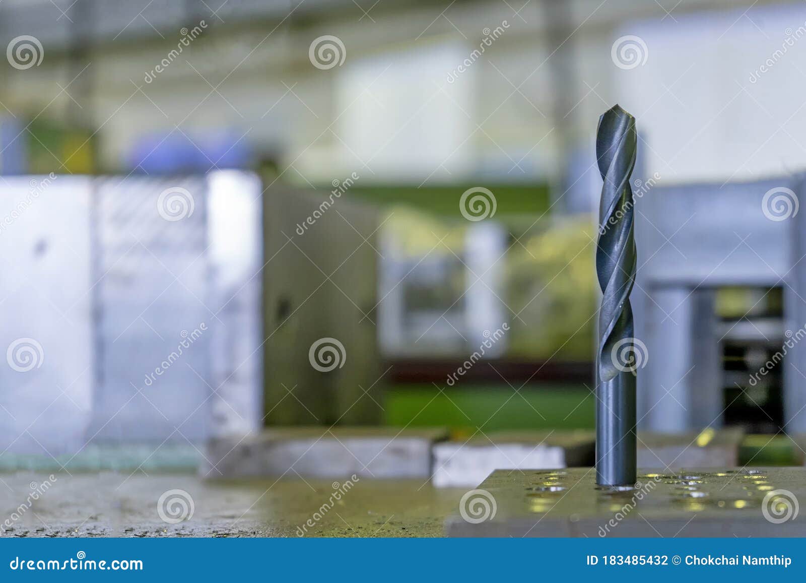 black drill bit on the work table industria