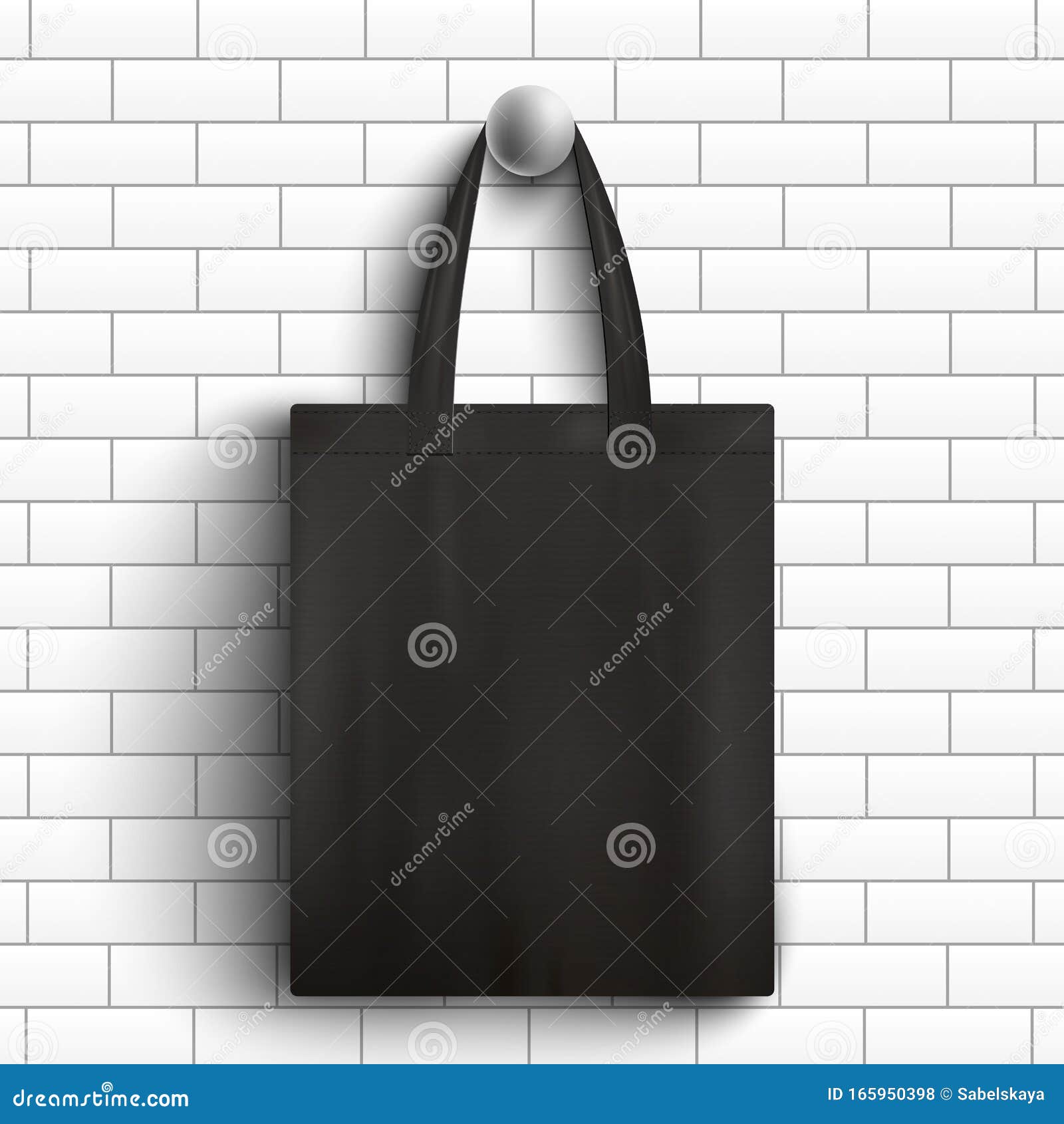 Download Black Fabric Tote Bag Hanging On White Brick Wall ...