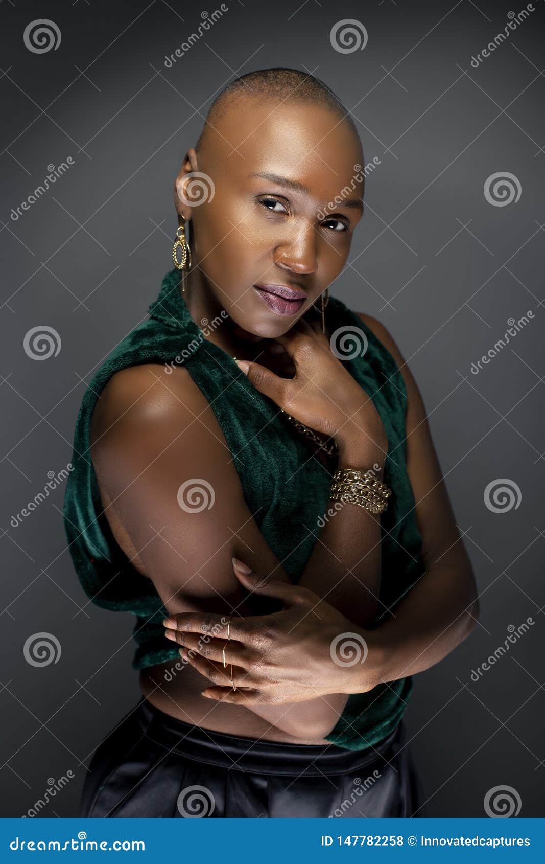 Black Female Fashion Model with Bald Hairstyle Looking Confident and Bold  Stock Photo - Image of ethnic, face: 147782258