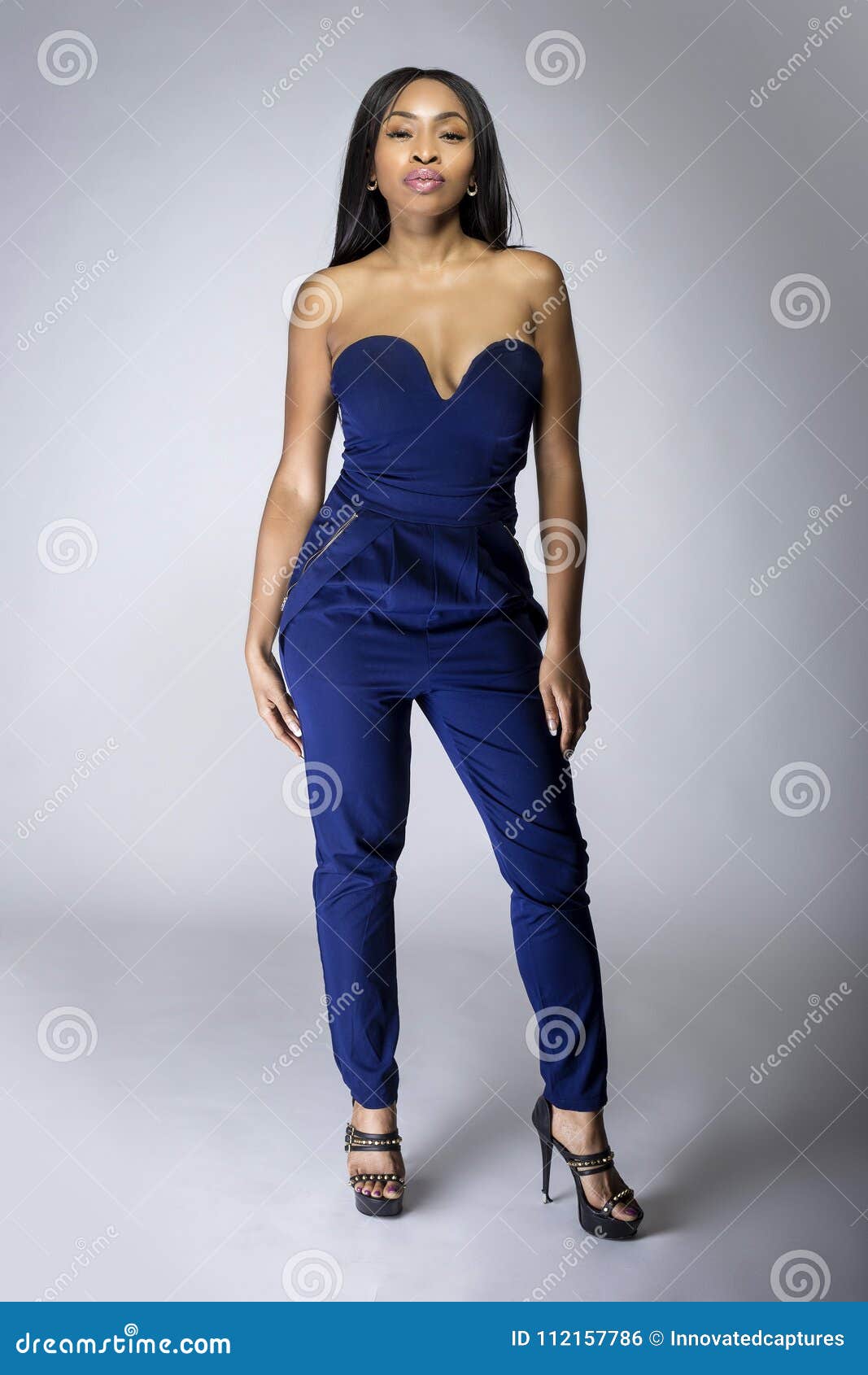 Black Female Fashion Model Wearing Blue Pants Stock Photo - Image of  ethnic, outfit: 112157786