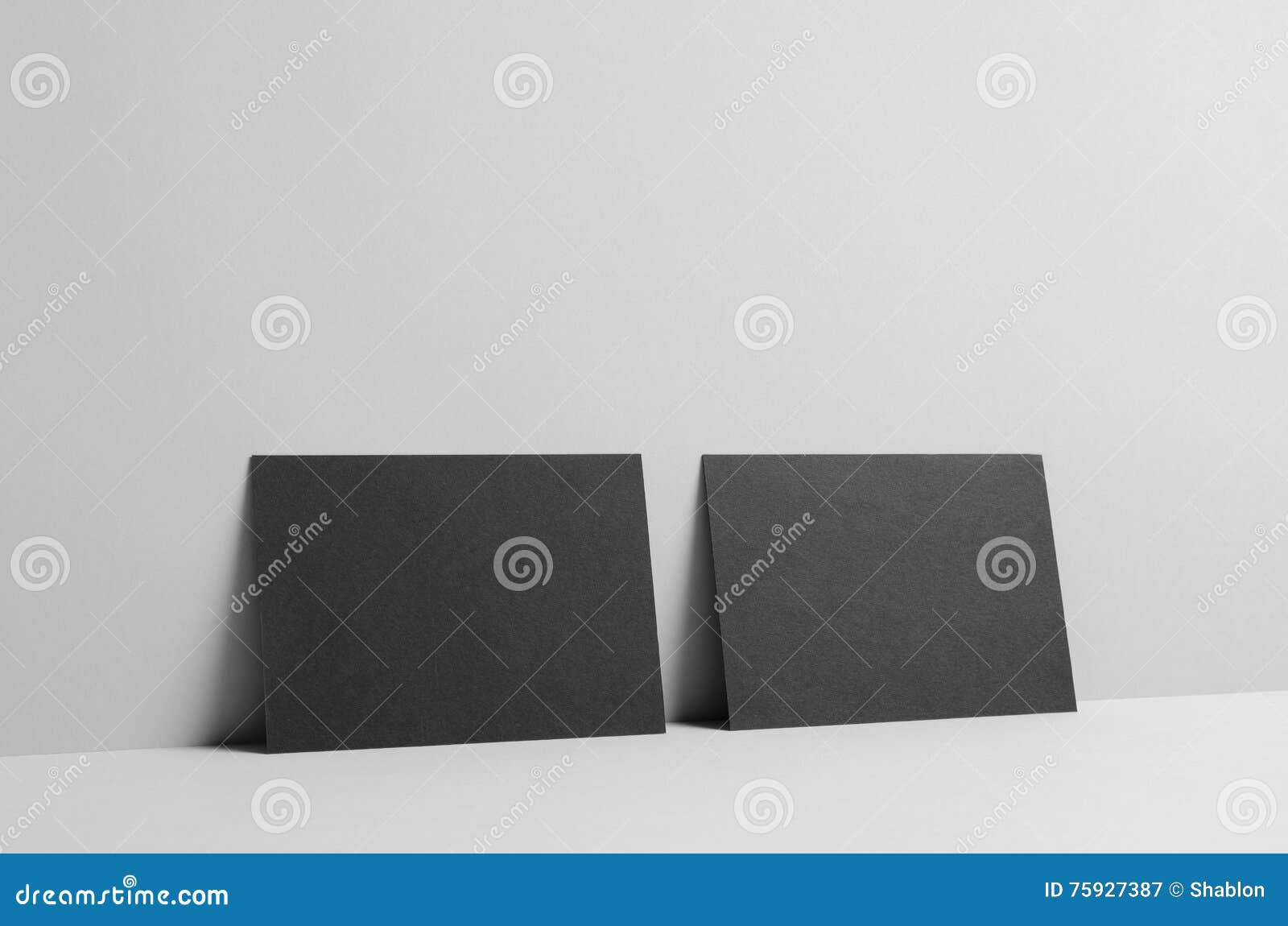black a6 flyer postcard invitation mock up wall background flyers on wall royalty free