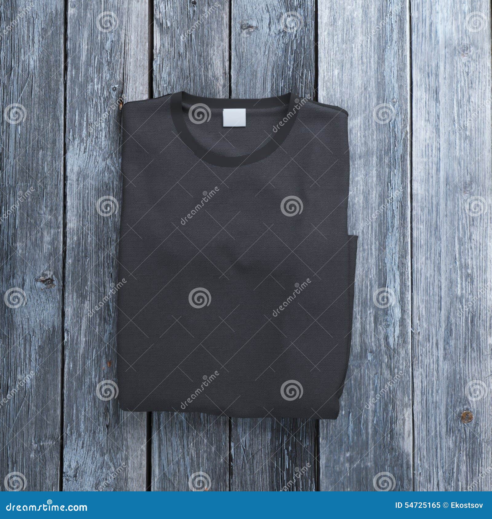 Black Folded T-shirt on Wooden Background Stock Image - Image of ...