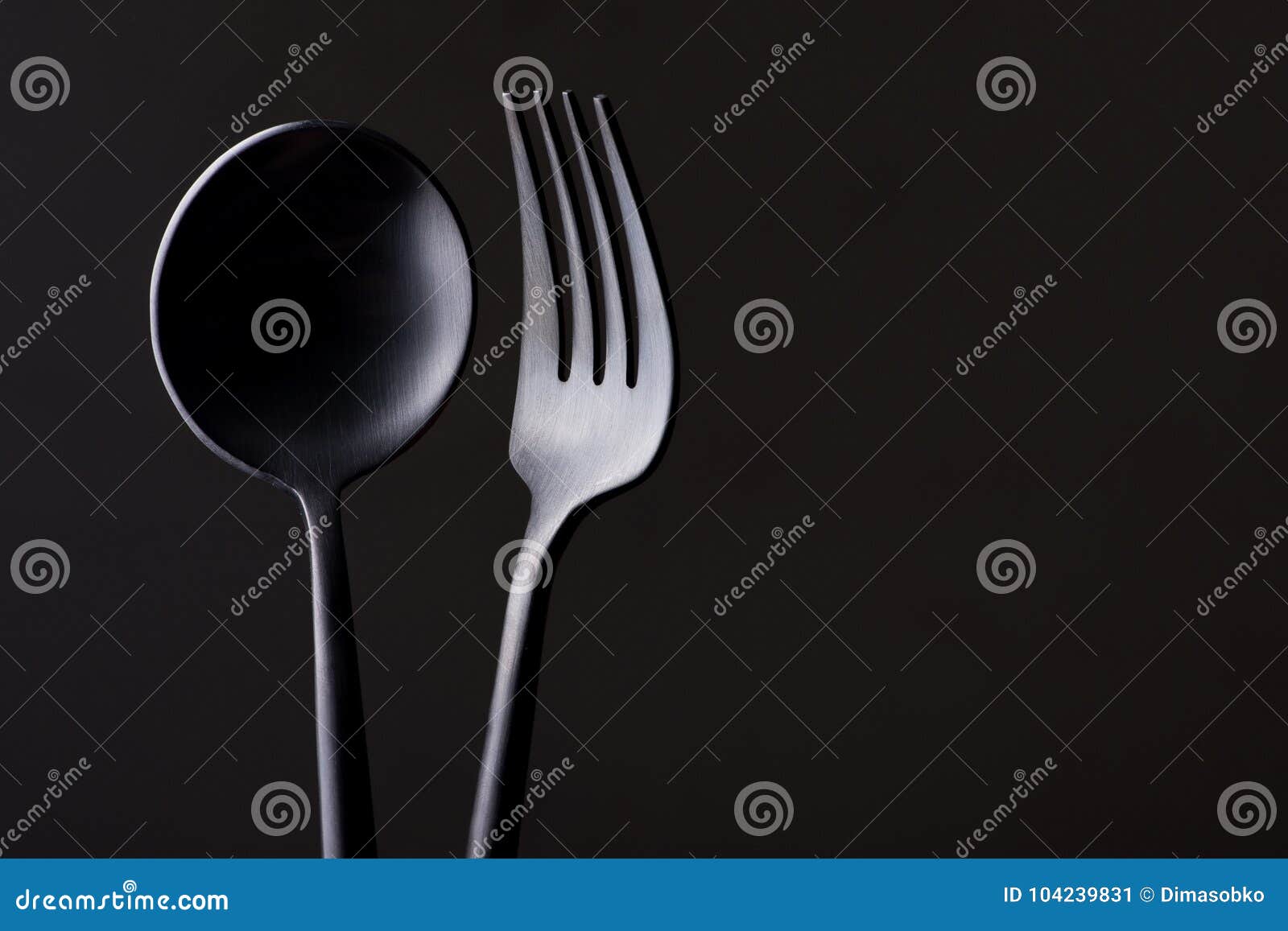 Black fork and spoon stock image. Image of stainless 104239831