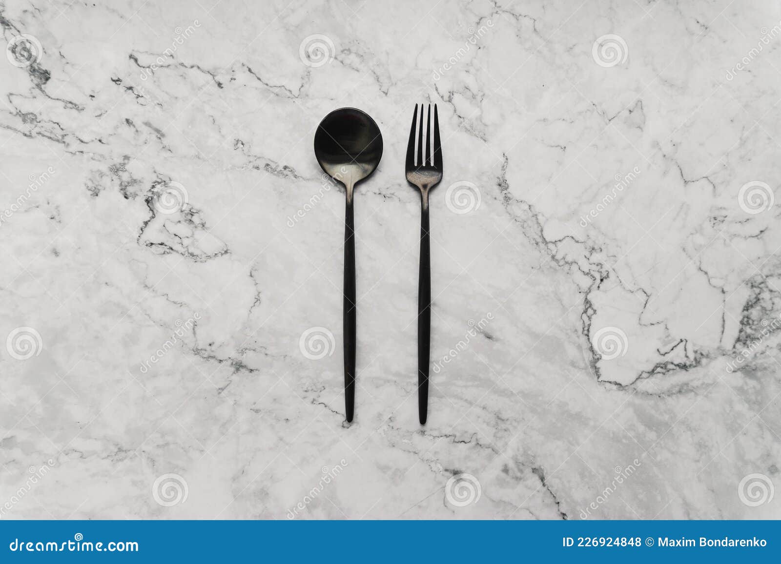 Black Fork and Spoon on a White Marble Surface Stock Photo Image of