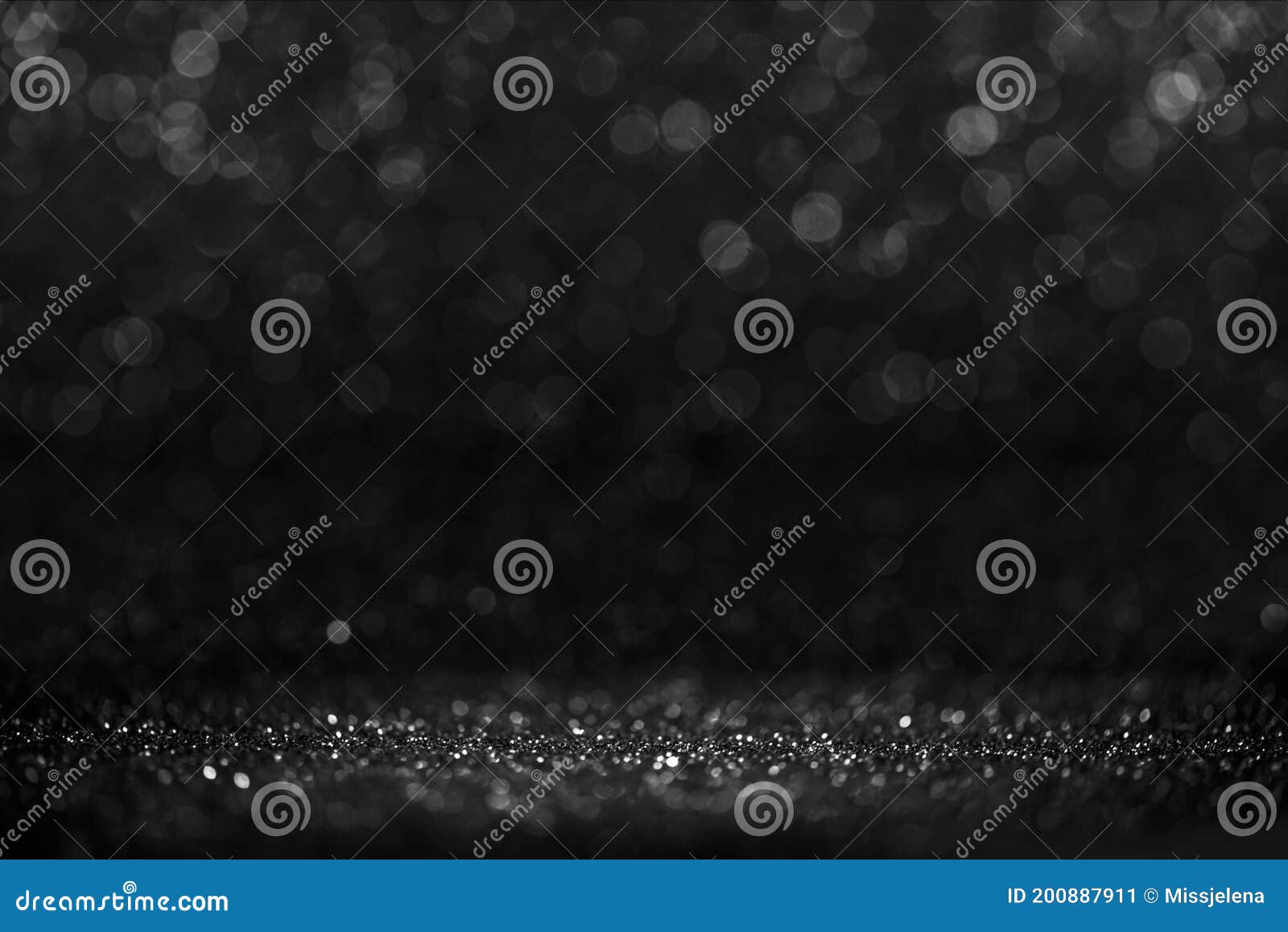 black friday bokeh background. elegant dark blur layout . silver and black glitter place on table with spotlight. luxury