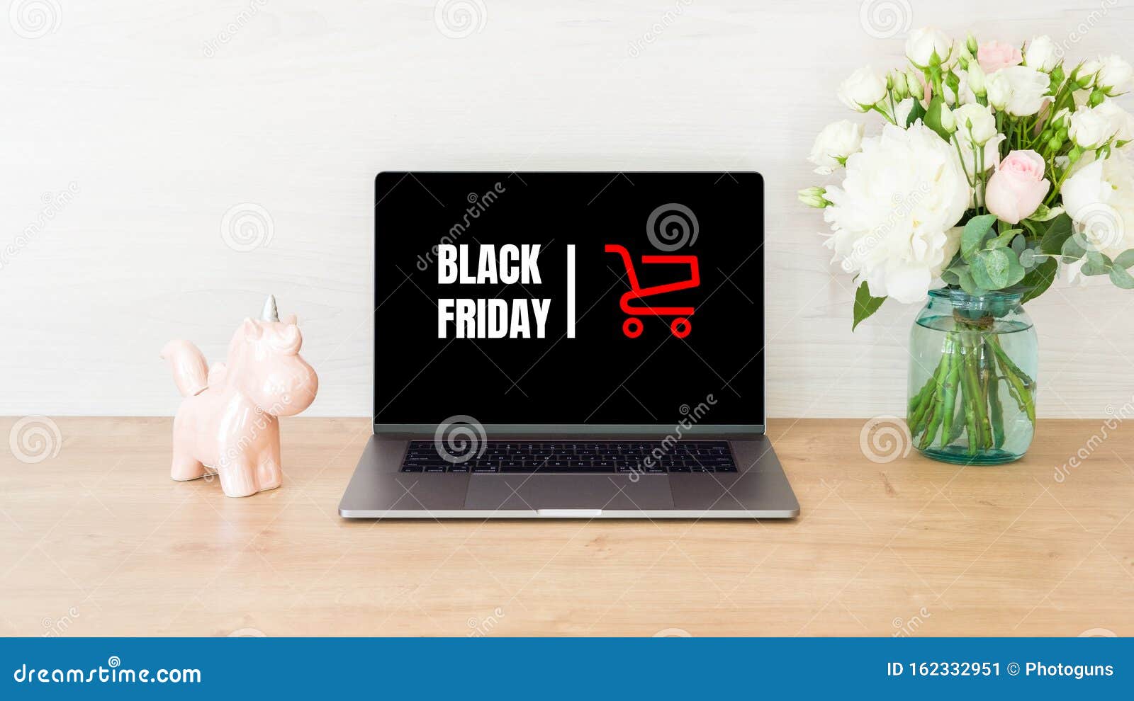 Black Friday Concept Laptop Computer Screen With Shopping Card