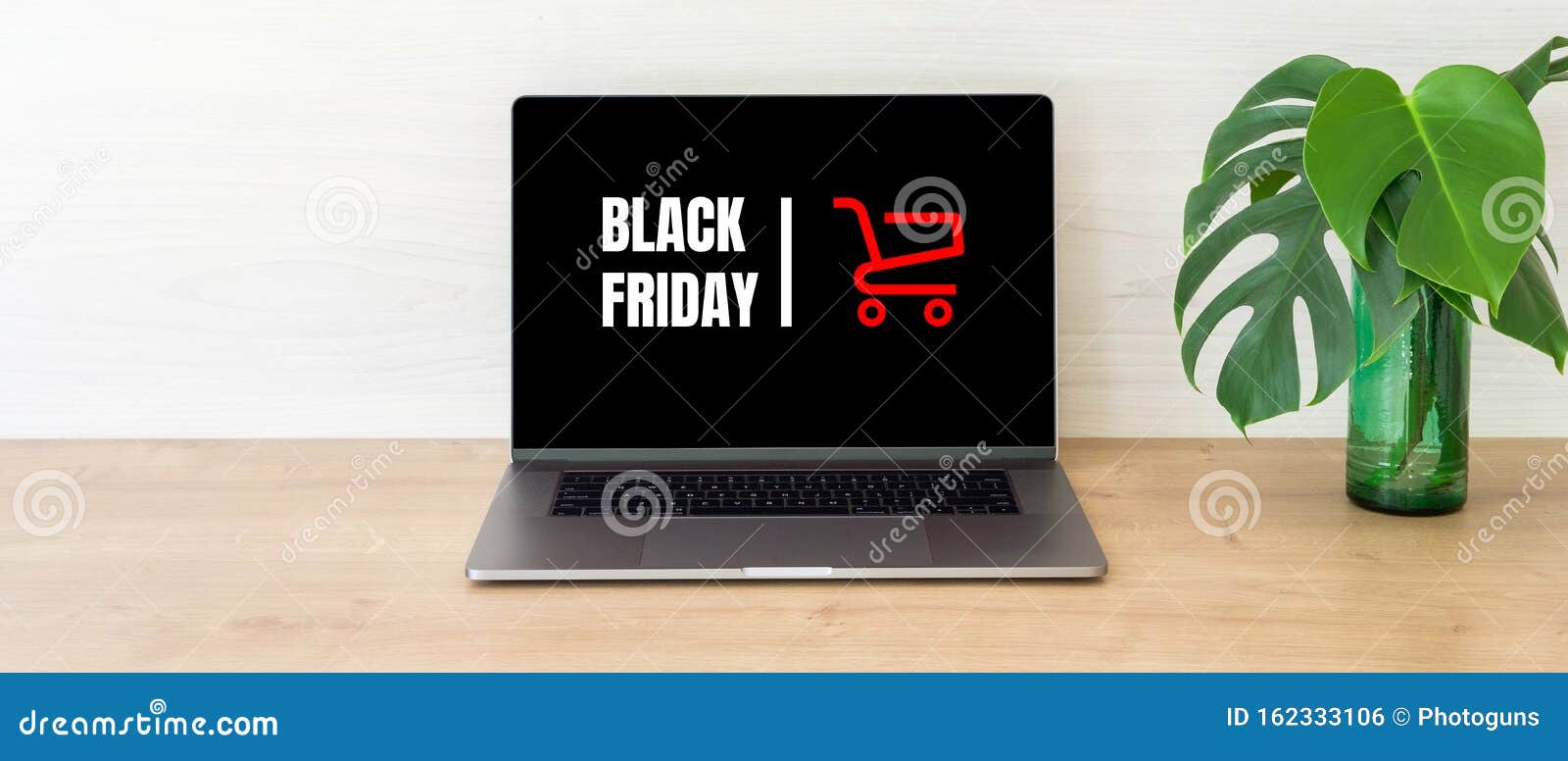 Black Friday Concept Laptop Computer Screen With Shopping Card