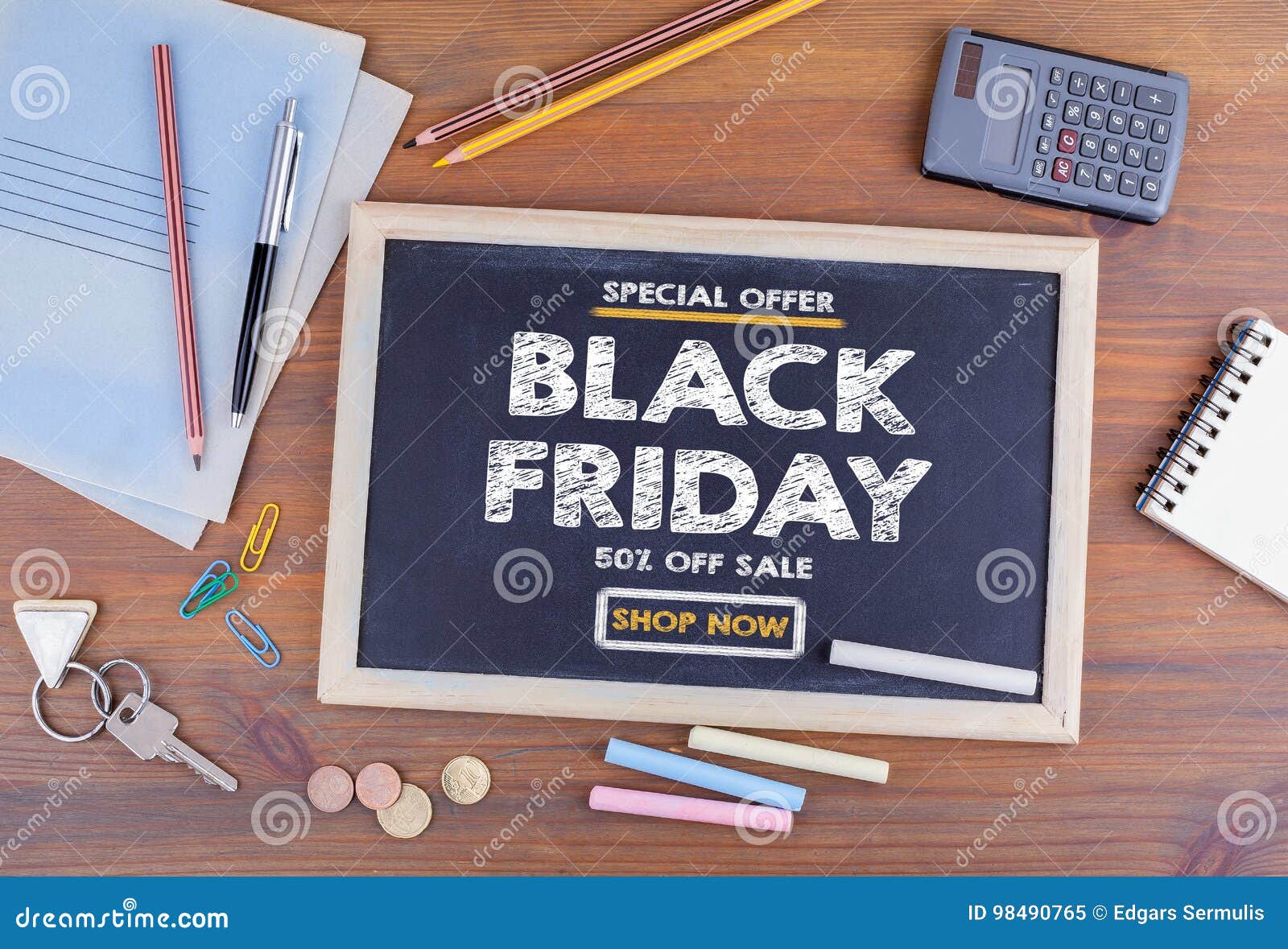 Black Friday Sale Chalkboard On Wooden Office Desk Stock Image