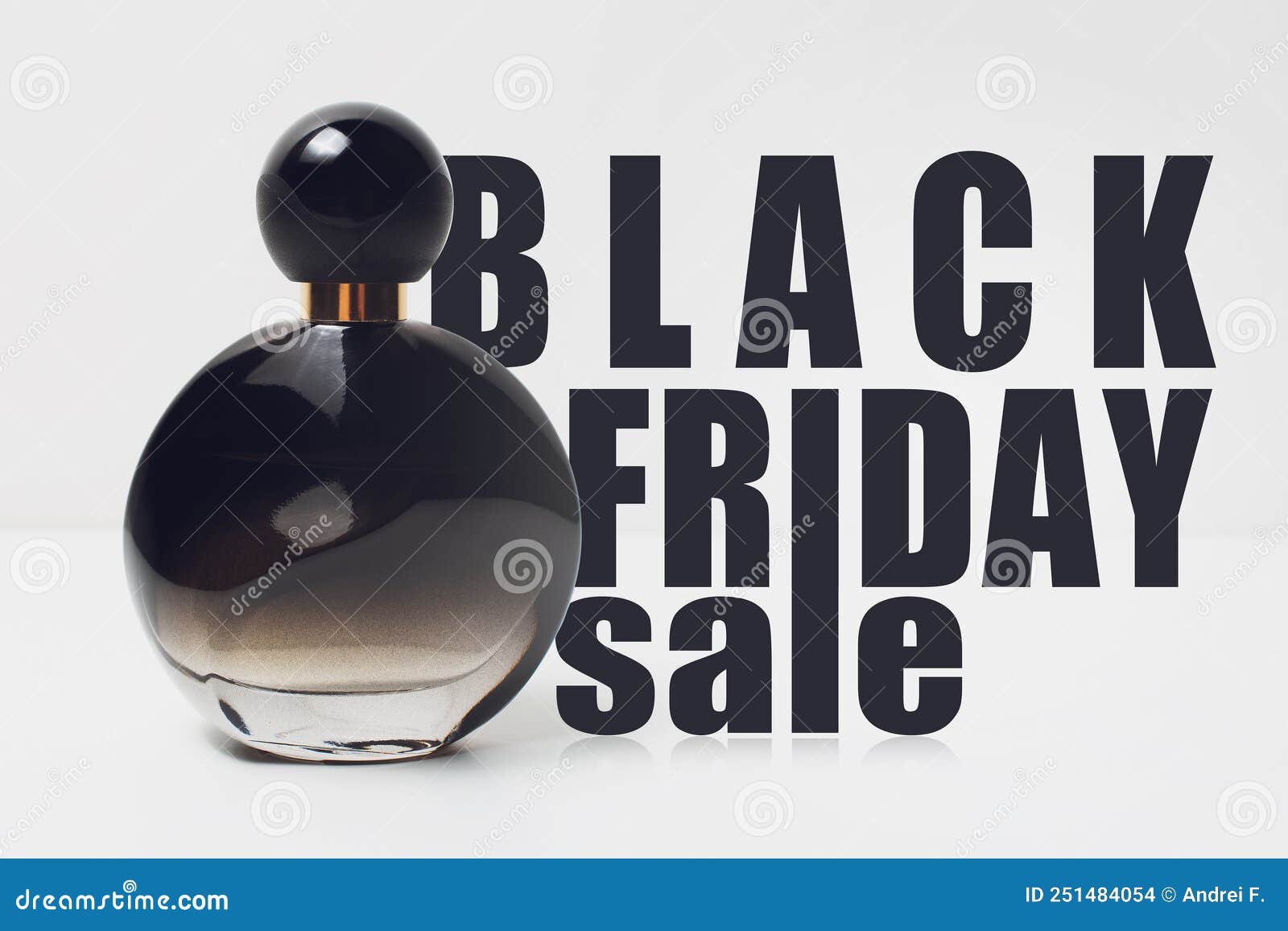 Black Friday Sale Text and Perfume Bottle on White Background. Stock
