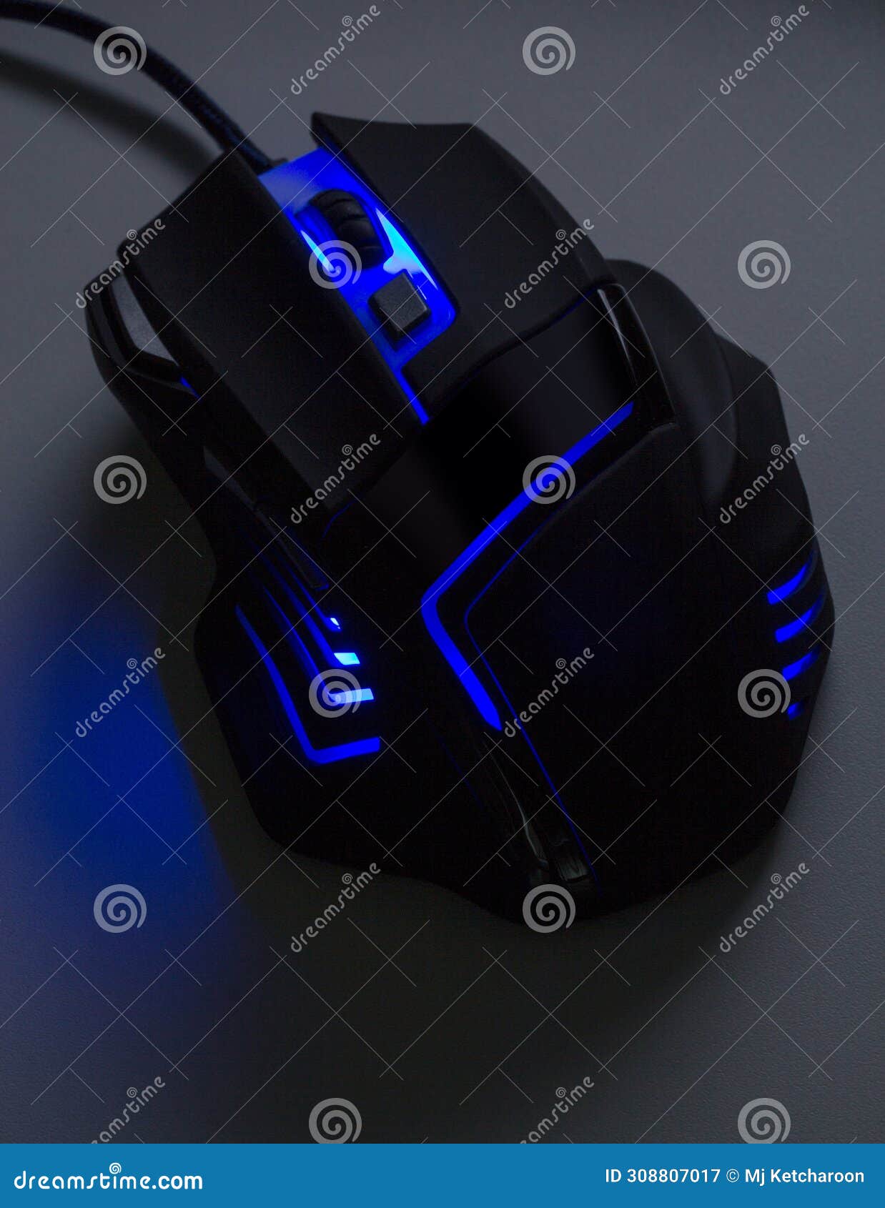 A Black Gaming Mouse with a Blue Light Stock Image Image of grip