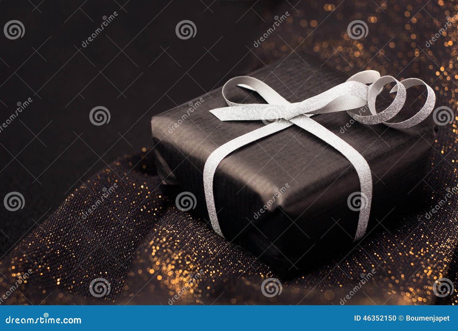 Black Gift Box on Shiny Background. Stock Photo Image of gold