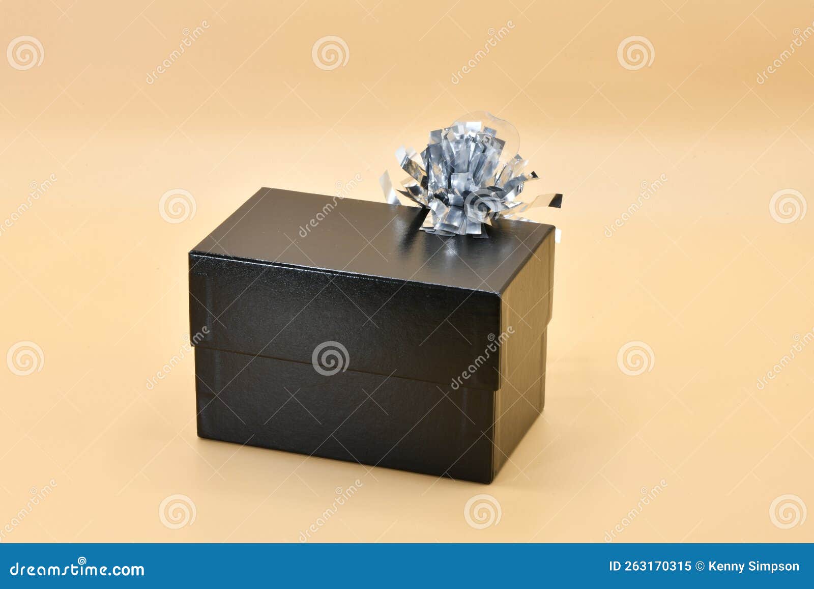 A Black Gift Box with a Silver Bow Stock Image Image of brown, brand